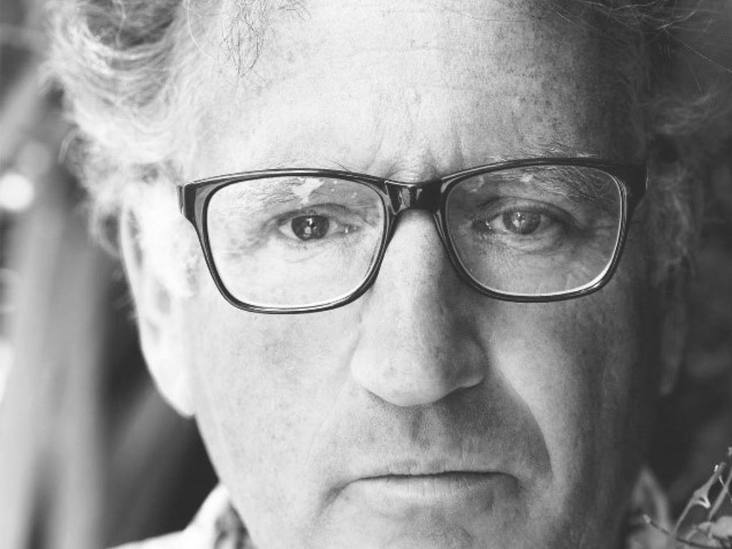 Richard Hopton's looking at the camera